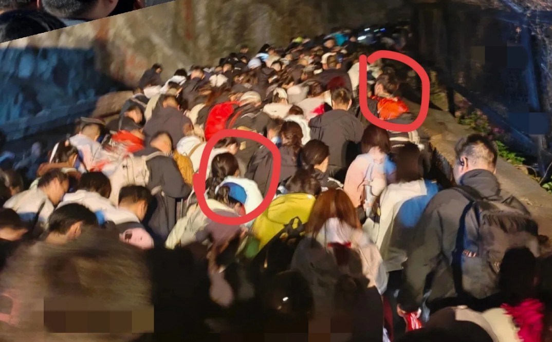 五一泰山人潮大作战：裹棉衣睡路边、公厕抱团取暖